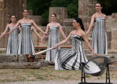 The Olympic Flame Begins Journey to France - Global News