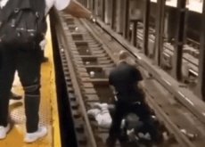 Police Officer Rescues Man on Subway Tracks - World News