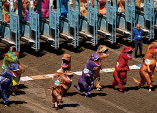 Inflatable T-Rexes Take the Track - Global News