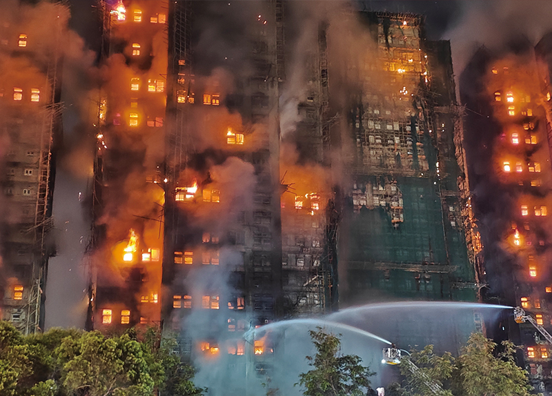 Deadly Blaze Sparks Anger and Calls for Reform in  Hong Kong8