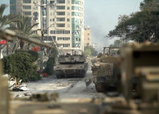 Israeli Tank Drives Through Downtown Gaza City - Photo News