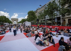 Paris’ Champs-Élysées Hosts Giant Picnic - Photo News