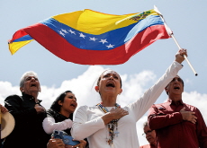 Opposition Leader Waves Venezuelan Flag to Protest Against Election Results - Photo News